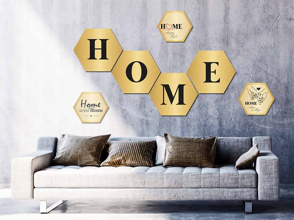 Elegante Hexagon Wandbilder / Wanddekoration in gold. Schriftzüge und Buchstaben